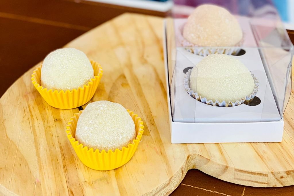 O valor agregado da apostila de brigadeiros, mostrando o material extra que transforma a confeiteira em uma empreendedora.